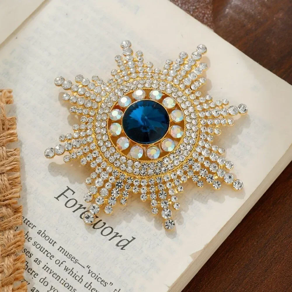 Regal Radiance Starburst Brooch Sapphire Blue Center Vintage Rhinestone Elegance